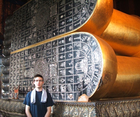 adam-infront-of-buddhas-feet